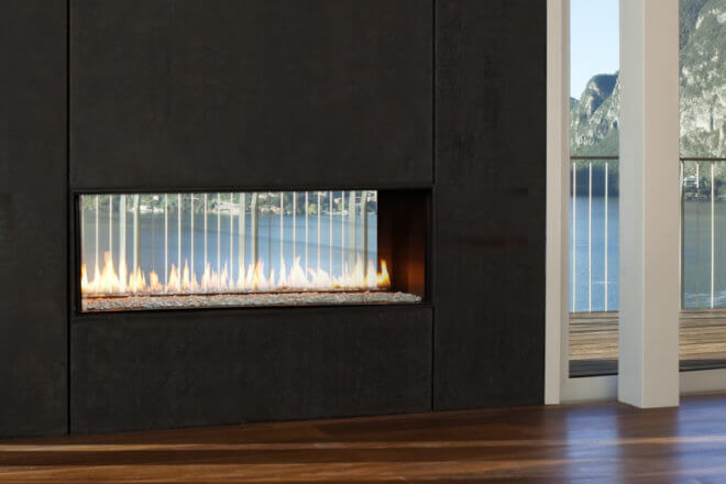 Montigo Exemplar R320ST fireplace shown between a living and outdoors