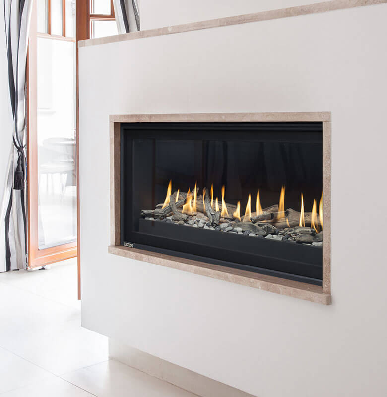 Montigo Phenom PL52 fireplace shown with a custom marble surround