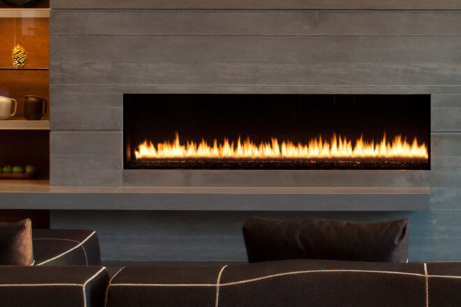 Montigo Exemplar R520 fireplace shown in a grand room with faux wood facing