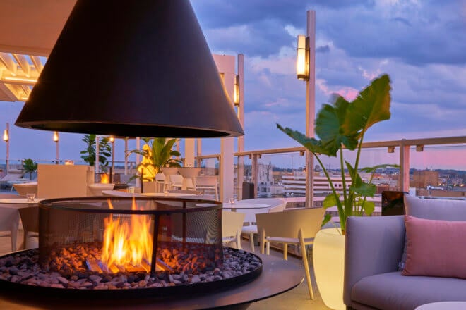 Montigo Custom Commercial Round Firepit CFPO-RD-48-TB-DL-MS on Hedy’s Rooftop lounge