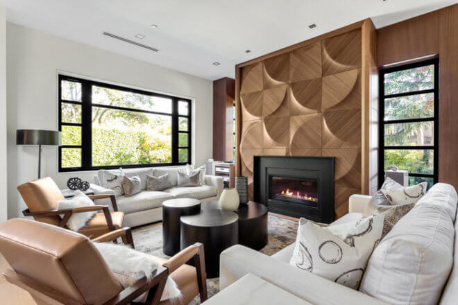 Phenom fireplace shown in a circular wood surround