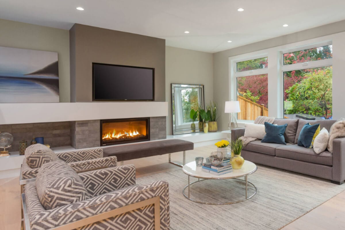 Phenom fireplace shown in a tile surround, tv above